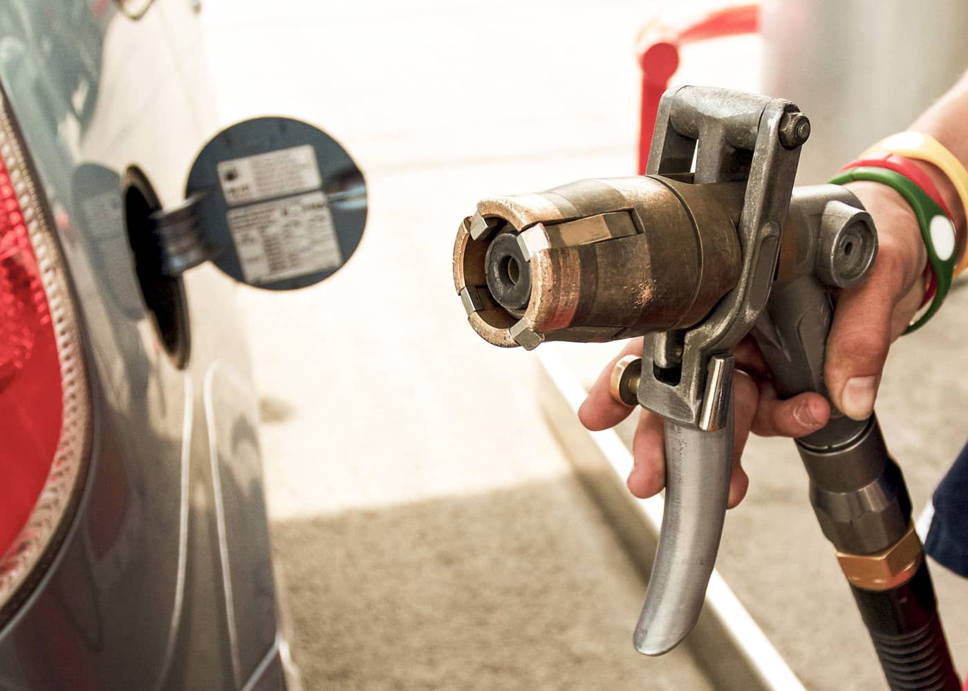 Gas pump nozzle representing gasoline-powered vehicles